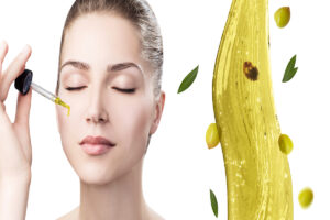 donna con olio di oliva sul viso